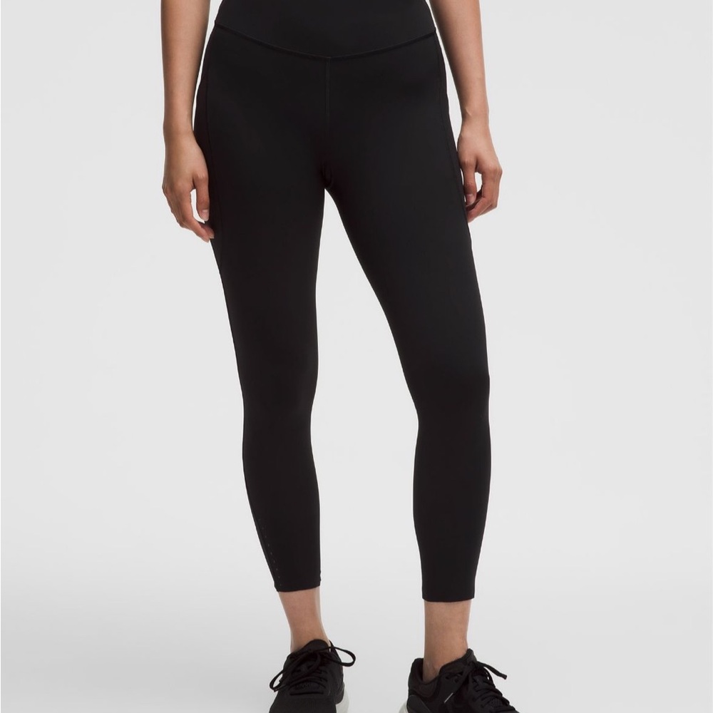 Lululemon Fast and Free 25” dark camo Leggings